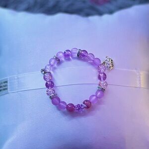 Purple bracelet with charms